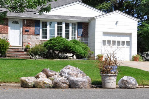 Residents arranging furniture for local collection in Uxbridge